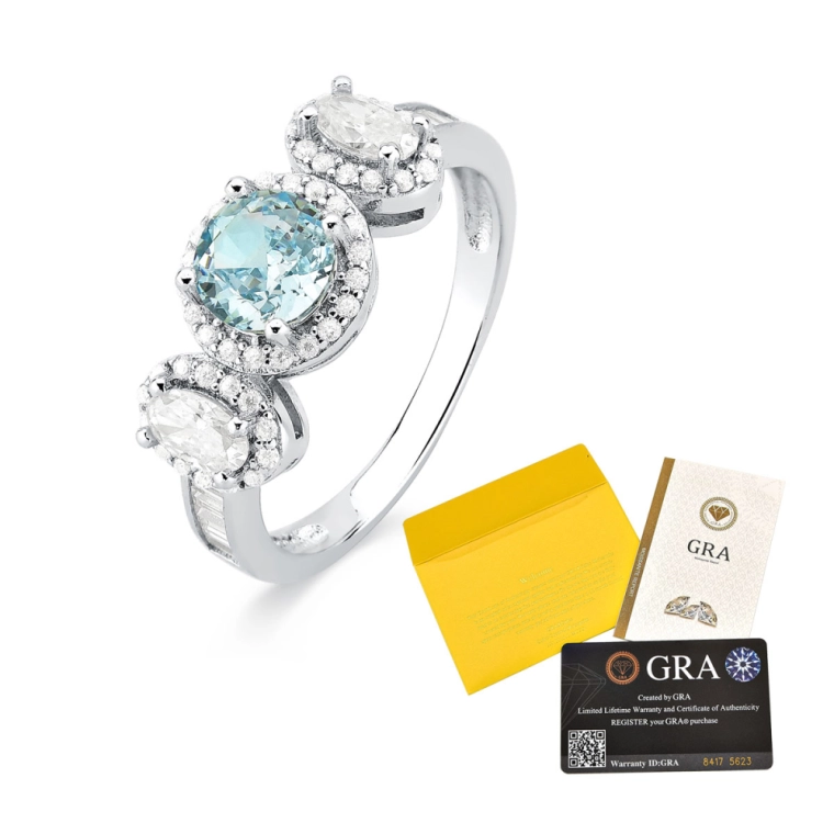 Anel Moissanite de Prata 925 Ponto de Luz Cravejado Azul Claro Produto Anel Moissanite de Prata 925 Ponto de Luz Cravejado Azul Claro