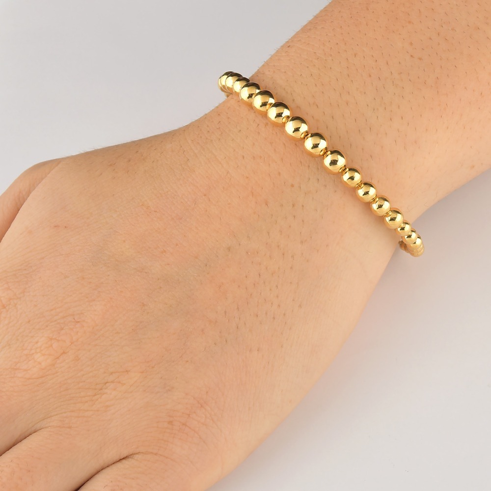 Produto Pulseira Rigída com Bolas em Ouro 18k - 750